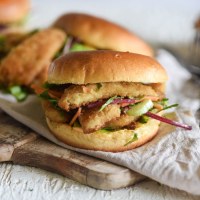 Crumbed whiting burgers with Sriracha mayo and slaw