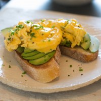 Creamy scrambled eggs with parmesan and chives