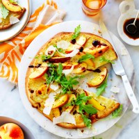 Yellow nectarine, artichoke and rocket pizza