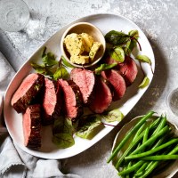 Whole Roasted Eye Fillet with Mustard, Parsley and Garlic Butter